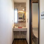 バイクガレージとウォークインシステム収納のある家（群馬県太田市）